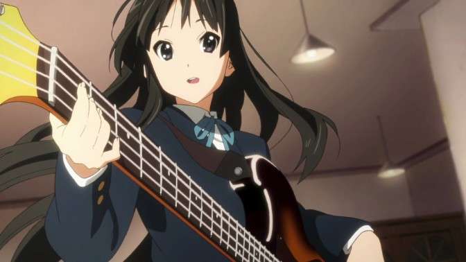 Mio Akiyama With Her Bass Guitar